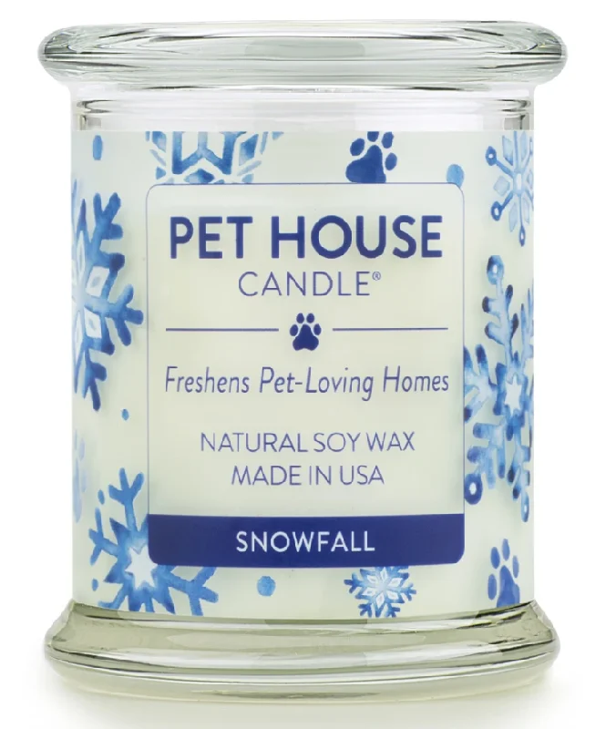 3. **Cat backpack space capsule**One Fur All Pet House 9oz Candle - Snowfall